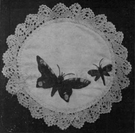 Fig. 1. One of a set of mats on which butterflies are embroidered in natural colouring, The Red Admiral is here shown with its exquisite shades of red, yellow, and blue