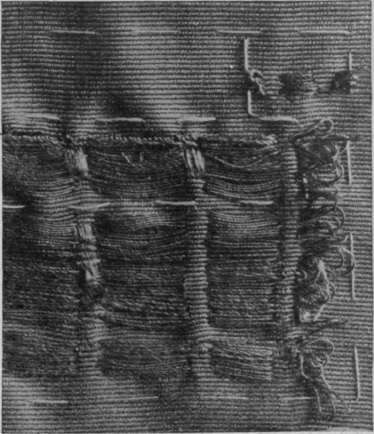 Fig. 6. A portion of a thin or broken piece of corded silk showing the first stage of darning. Loops of the darning silk would be left at the other end of the darn