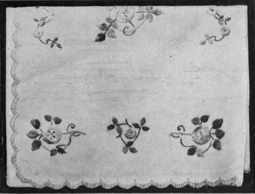 A pretty design for a nightdress case of conventional rose sprays and foliage, worked in satin stitch. The perfume used on its inside sachet should be attar of roses
