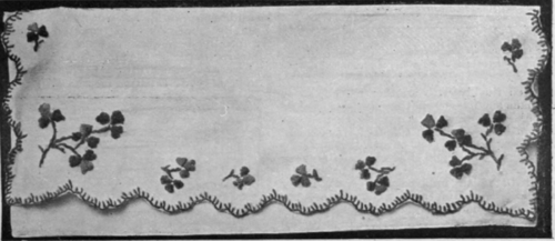 A shamrock pattern with a scalloped edging for a glove sachet