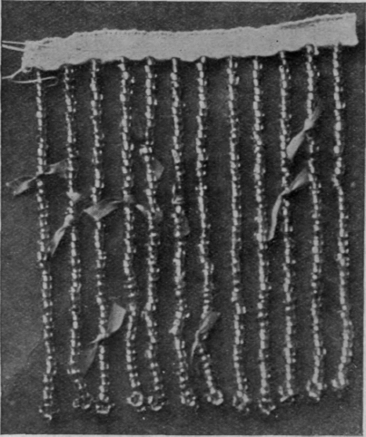 A silver fringe may be greatly improved by knots of bebe ribbon tied at intervals