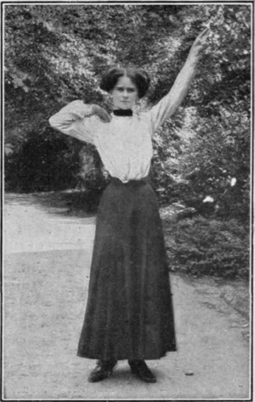 Fig. 3. Shoot the left arm into the air and bring the right fist to the right shoulder