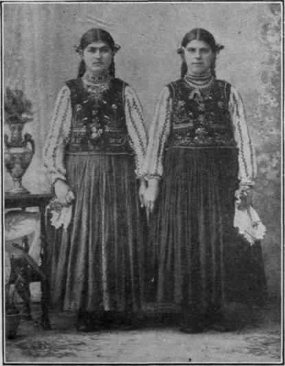 Typical peasant girls of Ruthenia, Upper Austria, in gala array. In this province old manners and customs still hold sway and are observed with due solemnity