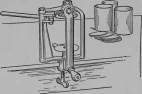 Fig. 40 - A small hand sealing-machine for medium size (No. 2) sanitary top tin cans.