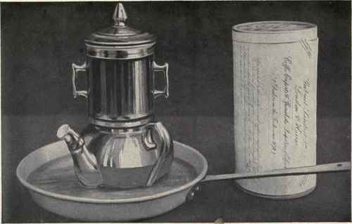 How To Make Good Coffee. No. 2. (See Also P. 398.) Showing the Coffee Pot, complete, standing in shallow pan of hot water. When ready, the infuser is removed, the lid placed on pot, and carried to the table.