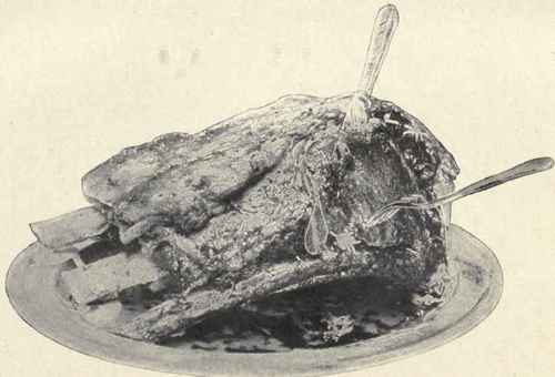 Roast Ribs of Beef. Showing the first cut made in carving this joint. All subsequent cuts follow the first.