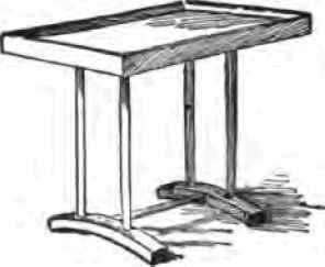 A plant table for holding boxes of seedlings.