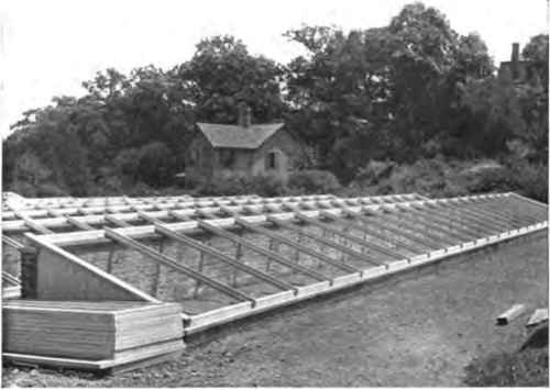 Coldframes of brick and iron.