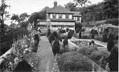Fig. 113.   Flower garden on the axis of the living room. All on one plane below the house level.   See page 124.