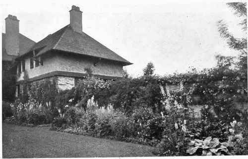 Fig. 155.   An attractive hardy border.   See page 197.