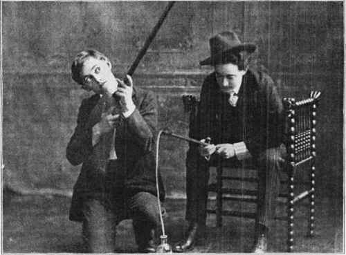 The hypnotist has impressed it upon the subject with the broom that he is Col. Roosevelt hunting mountain lions. The other subject thinks he is Col. Bryan out fishing.