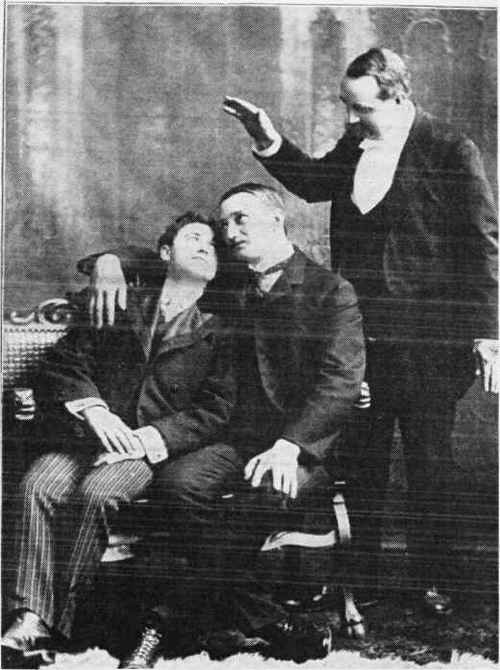 These hypnotized subjects believe themselves to be a newly married couple sitting for a photograph.