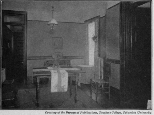 Fig. 35.   A table laid with strips of blue and white Japanese toweling.