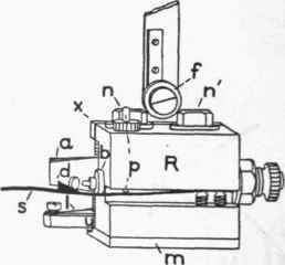Detail for one of the contact devices struck open by the pendulum.