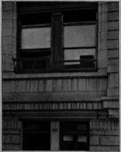 A Guard to Intercept Falling Tools and Other Objects, when Men are Working about Windows.