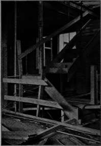 An Iron Stairway, Broken by a Falling Load of Material.