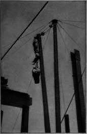 Steelmen being Lifted to their Work.