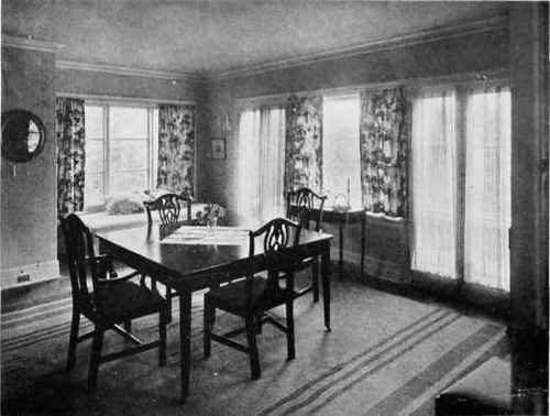 A CHARMINGLY SIMPLE DINING ROOM Modern furniture of Hepplewhite type.