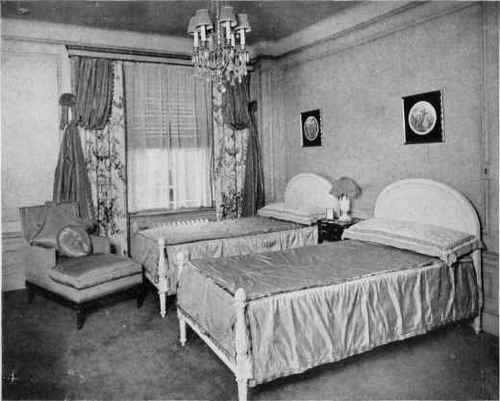 A FRENCH BEDROOM IN ROSE AND GREEN.