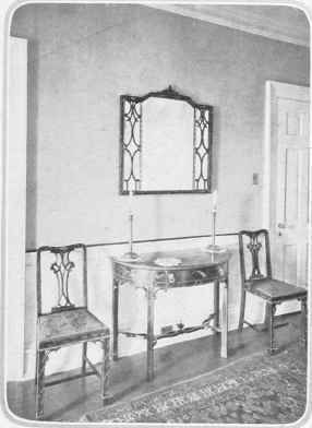 A HALL WITH CHINESE CHIPPENDALE LACQUERED FURNITURE.