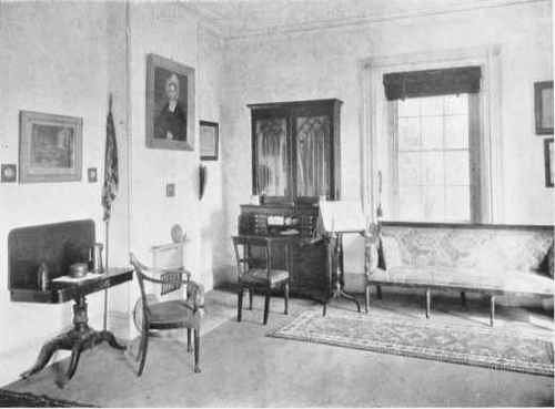 A RESTFUL LIVING ROOM WITH SHERATON AND AMERICAN EMPIRE FURN1TURE.
