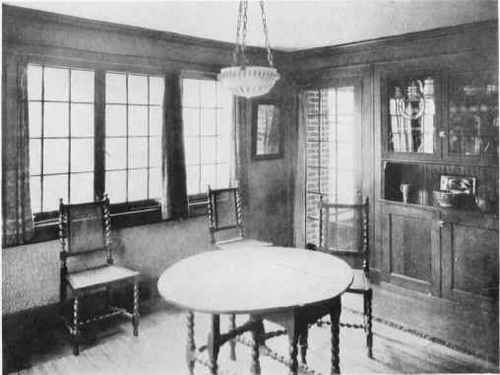 A ROOM CONSISTENT WITH OAK FURNITURE.