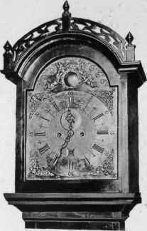 Dial of tall clock, showing arched top, 1725 30.