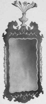 Looking Glass with mahogany and gilt frame, 1780 90.
