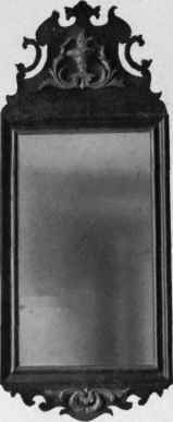 Looking Glass with walnut and gilt frame, 1725 50.