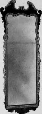 Looking Glass with walnut and gilt frame, first quarter eighteenth century.