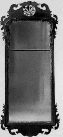 Looking Glass with walnut and gilt frame, first quarter eighteenth century.