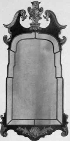Looking Glass with walnut and gilt frame, first quarter eighteenth century.
