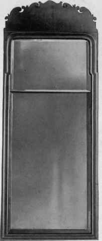 Looking Glass with walnut frame, first quarter eighteenth century.
