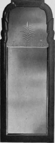 Looking Glass with walnut frame, first quarter eighteenth century.
