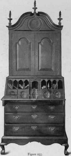 Slant Top Scrutoire with cabinet top and bird's claw and ball feet, 1725 50.
