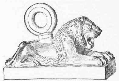 Antique Bronze. Recumbent Lion bearing a ring. From the threshold of a gate of the Palace of Khorsabad.