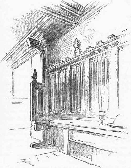 FIXED LINEN PANELLED SETTLE IN THE GREEN DRAGON INN, COMBE ST. NICHOLAS, SOMERSET
