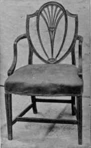 Interlacing Heart Back, Single Curve Arm Supports, Tapered, Grooved Legs, Stretchers.