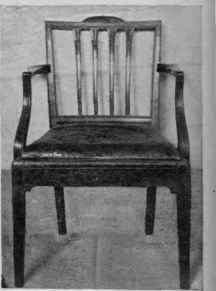 Square Barred Back, Straight Raised Top rail, Curved Arm Supports.