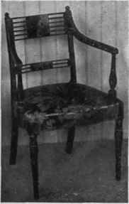 Straight Panelled Top rail, Downward Curved Arms, Reeded Vase, Baluster Arm Supports.