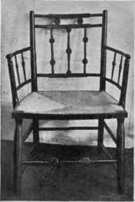 Turned and Painted Rush Bottom, Canted and Spindled Arms.