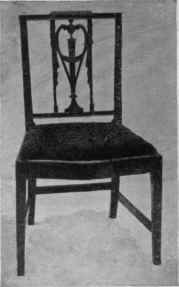 Vase Back, Straight Raised Top rail, Tapered Grooved Legs, Shaped Seat rail.