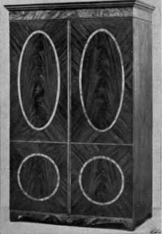 Veneered and Inlaid Wardrobe, Oval and Round Panels, Shaped Apron.