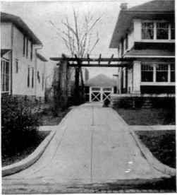 A concrete driveway from the street to the home garage at the back of the lot is many times better than a pair of ruts and a string of mudholes.