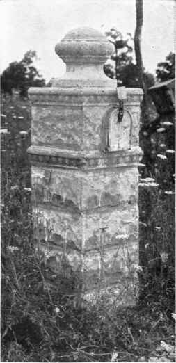 Column of concrete block made to serve as a container for the rural delivery mail box. This idea could be made a feature of concrete gate posts.