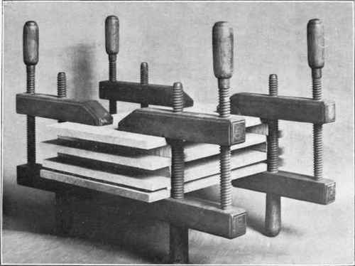 Fig. 5. Clamping up boards to keep them from warping.