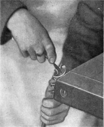 Fig. 45.   Filing an Auger Bit.