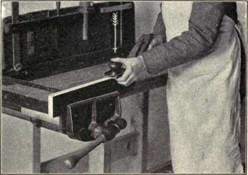 Fig. 60.   Beginning the Stroke with a Jack Plane.