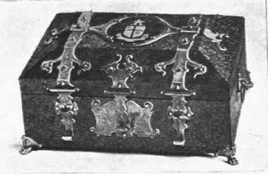 Fig. 10. Casket covered with tooled painted and gilt leather and enriched with bronze mounts and enamelled crest.