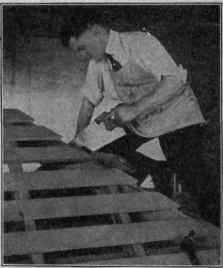 Fig. 92. Sawing Roof Boards